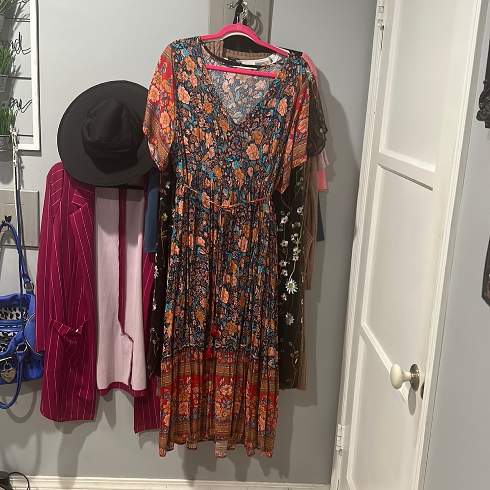 Maxi dress with tassle belt
